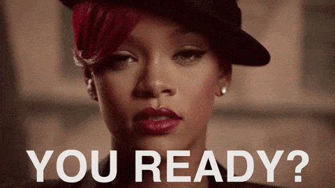 Rihanna with red hair asking if 'You ready?'